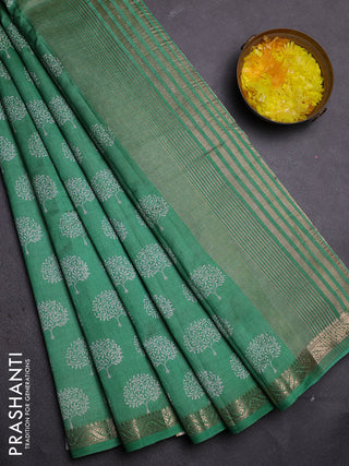 Semi raw silk saree green with allover butta prints and zari woven border