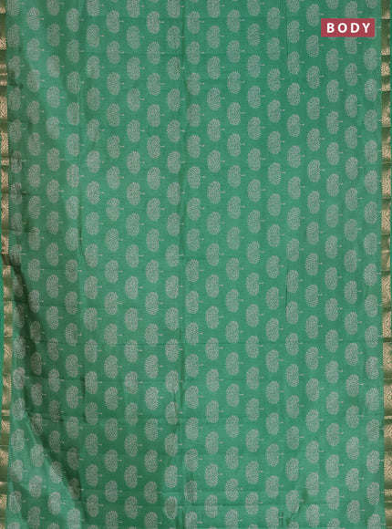 Semi raw silk saree green with allover butta prints and zari woven border