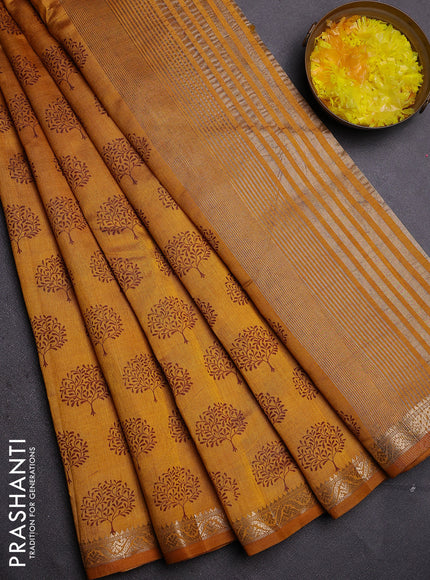 Semi raw silk saree mustard yellow with allover butta prints and zari woven border