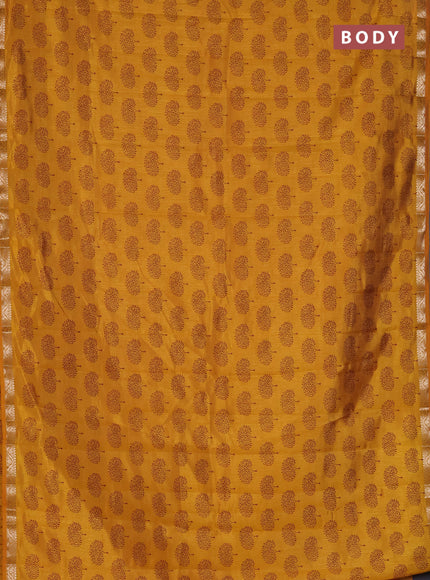 Semi raw silk saree mustard yellow with allover butta prints and zari woven border