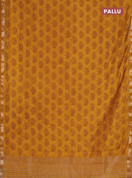 Semi raw silk saree mustard yellow with allover butta prints and zari woven border