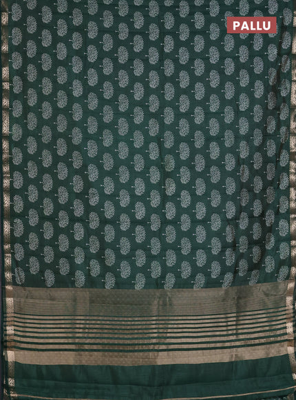 Semi raw silk saree bottle green with allover butta prints and zari woven border