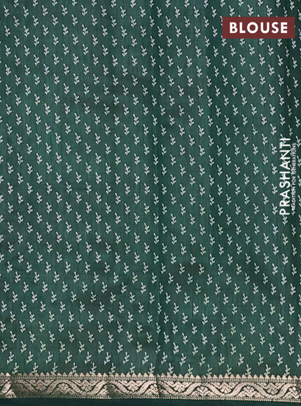 Semi raw silk saree bottle green with allover butta prints and zari woven border