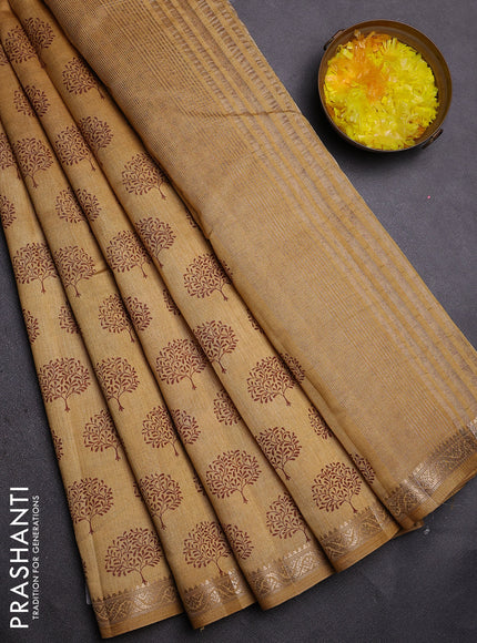Semi raw silk saree sandal with allover butta prints and zari woven border