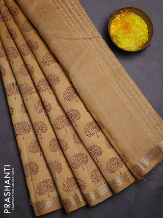 Semi raw silk saree sandal with allover butta prints and zari woven border