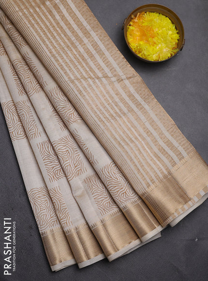 Semi raw silk saree cream with allover box type butta prints and zari woven border