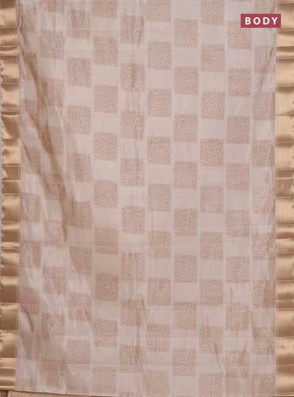 Semi raw silk saree cream with allover box type butta prints and zari woven border