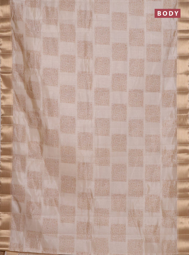 Semi raw silk saree cream with allover box type butta prints and zari woven border