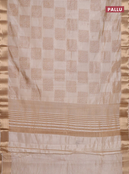 Semi raw silk saree cream with allover box type butta prints and zari woven border