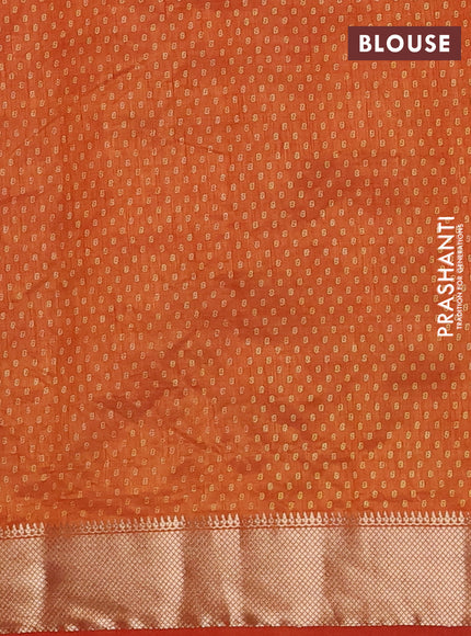 Semi raw silk saree rust shade with allover box type butta prints and zari woven border
