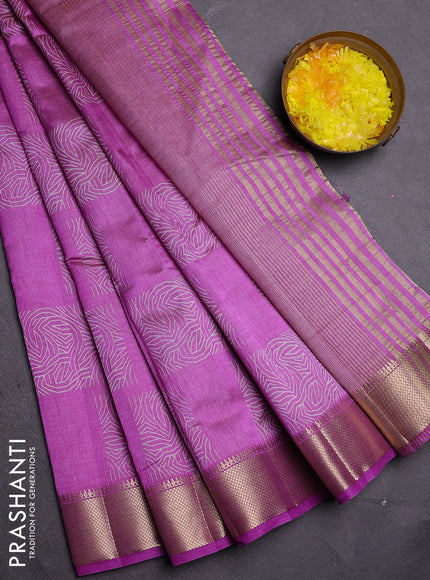 Semi raw silk saree lavender with allover box type butta prints and zari woven border