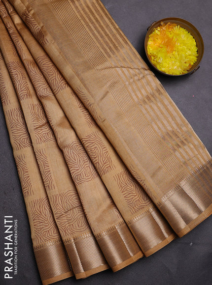 Semi raw silk saree sandal with allover box type butta prints and zari woven border