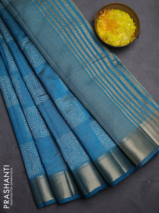 Semi raw silk saree teal blue with allover box type butta prints and zari woven border