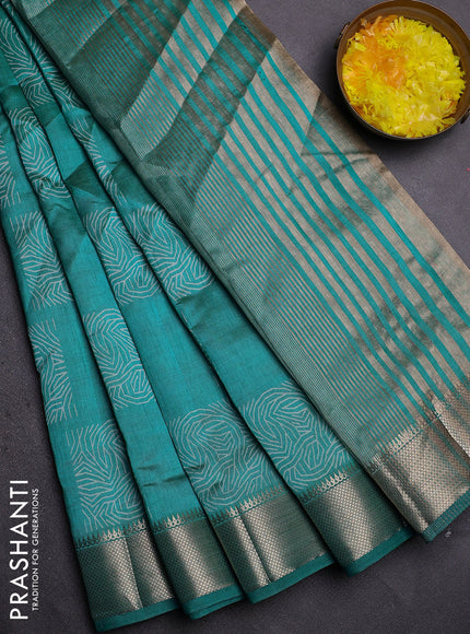 Semi raw silk saree teal blue with allover box type butta prints and zari woven border