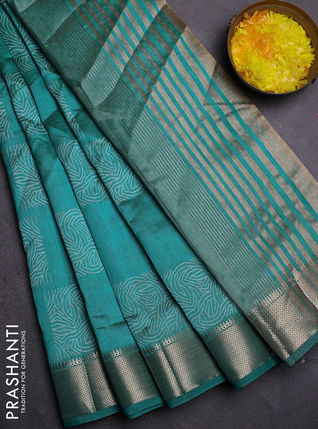 Semi raw silk saree teal blue with allover box type butta prints and zari woven border