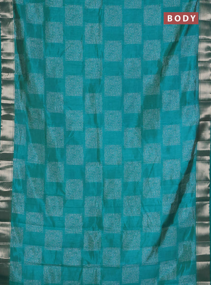 Semi raw silk saree teal blue with allover box type butta prints and zari woven border