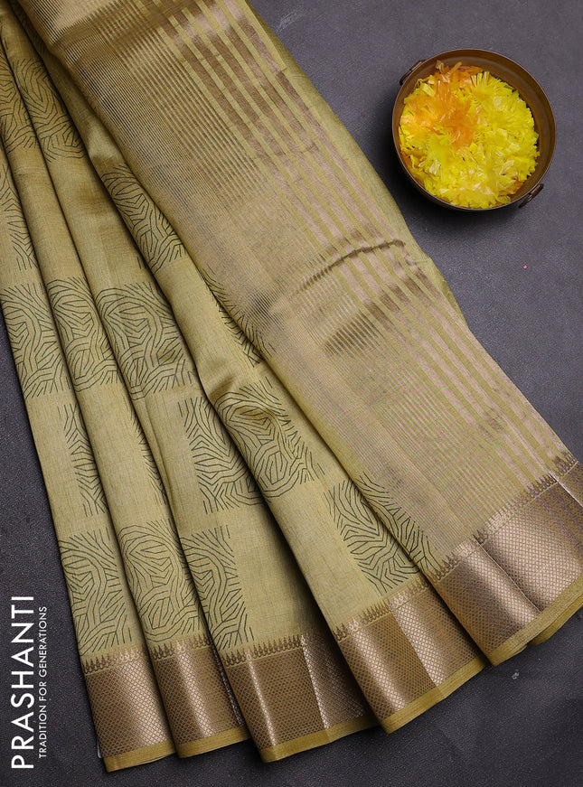 Semi raw silk saree mustard shade with allover box type butta prints and zari woven border
