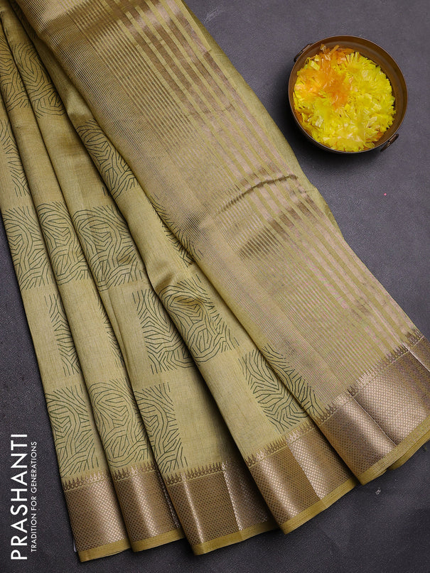 Semi raw silk saree mustard shade with allover box type butta prints and zari woven border