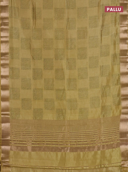 Semi raw silk saree mustard shade with allover box type butta prints and zari woven border