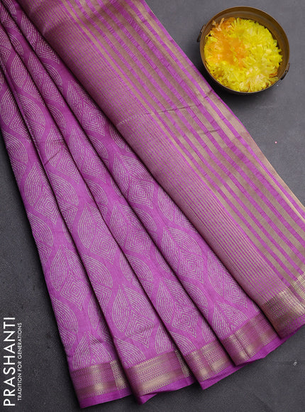 Semi raw silk saree purple with allover geometric prints and zari woven border