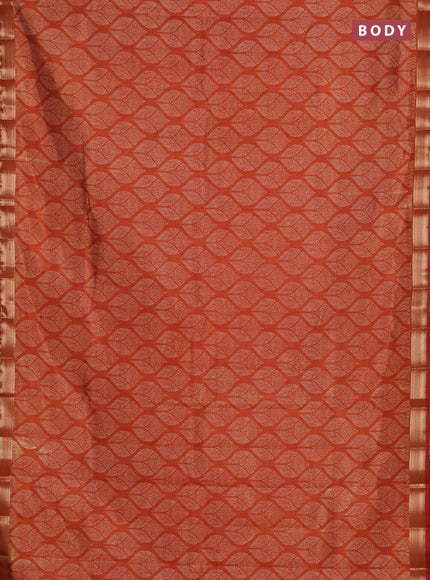 Semi raw silk saree rust shade with allover geometric prints and zari woven border