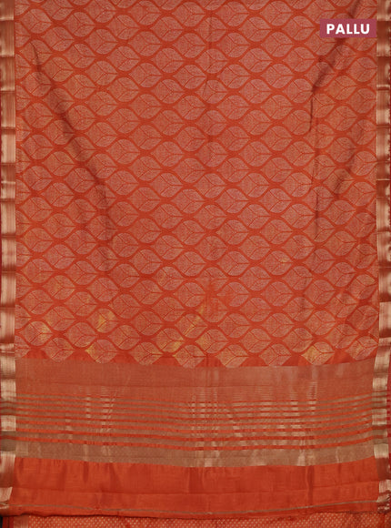 Semi raw silk saree rust shade with allover geometric prints and zari woven border
