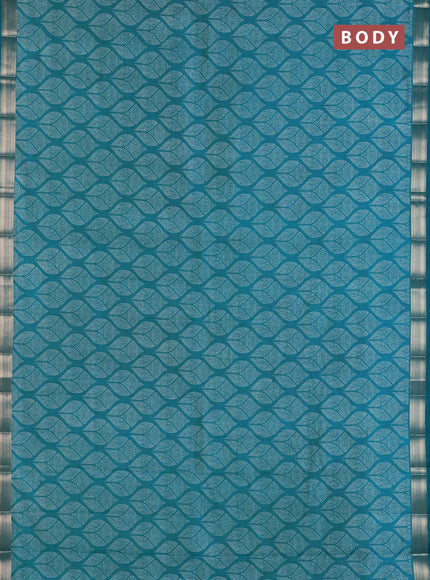 Semi raw silk saree teal blue with allover geometric prints and zari woven border