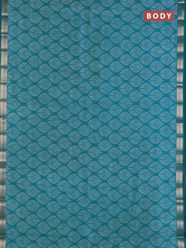 Semi raw silk saree teal blue with allover geometric prints and zari woven border