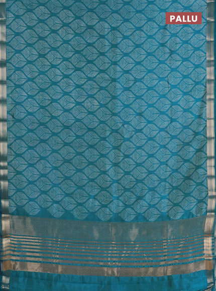 Semi raw silk saree teal blue with allover geometric prints and zari woven border