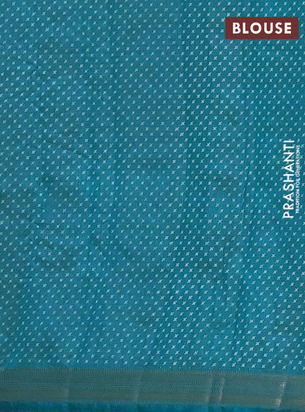 Semi raw silk saree teal blue with allover geometric prints and zari woven border