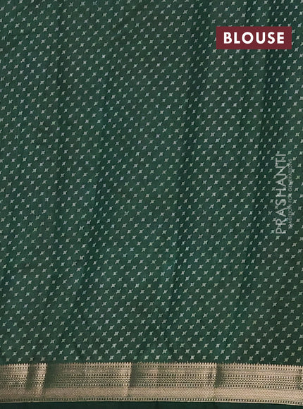 Semi raw silk saree bottle green with allover geometric prints and zari woven border