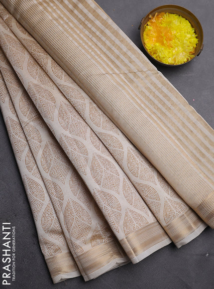 Semi raw silk saree cream with allover geometric prints and zari woven border
