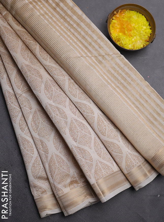 Semi raw silk saree cream with allover geometric prints and zari woven border