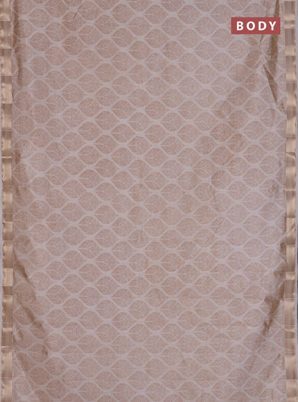 Semi raw silk saree cream with allover geometric prints and zari woven border