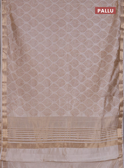 Semi raw silk saree cream with allover geometric prints and zari woven border