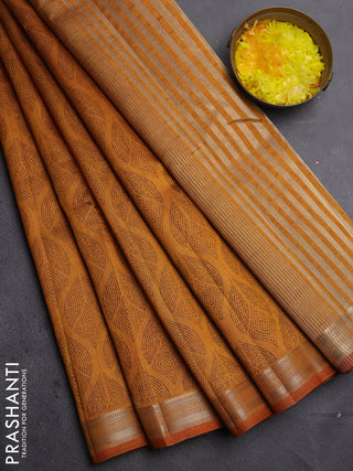 Semi raw silk saree dark mustard with allover geometric prints and zari woven border