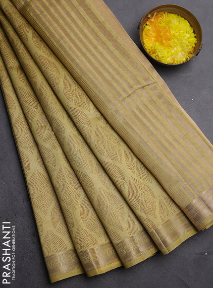 Semi raw silk saree mustard shade with allover geometric prints and zari woven border