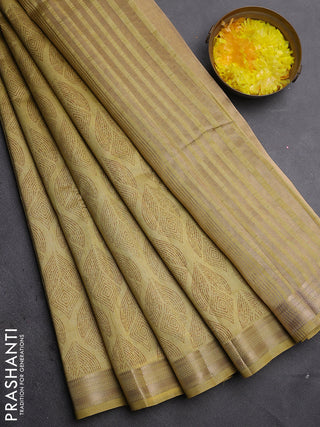 Semi raw silk saree mustard shade with allover geometric prints and zari woven border