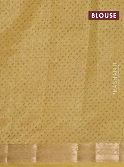 Semi raw silk saree mustard shade with allover geometric prints and zari woven border