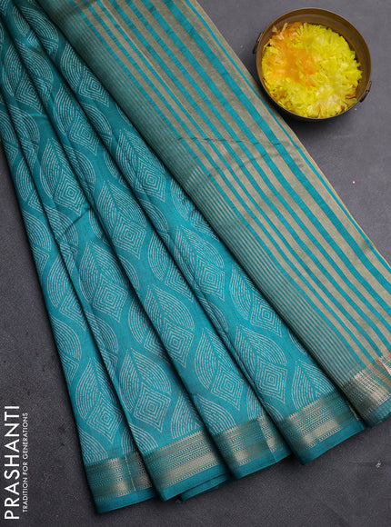 Semi raw silk saree teal green with allover geometric prints and zari woven border