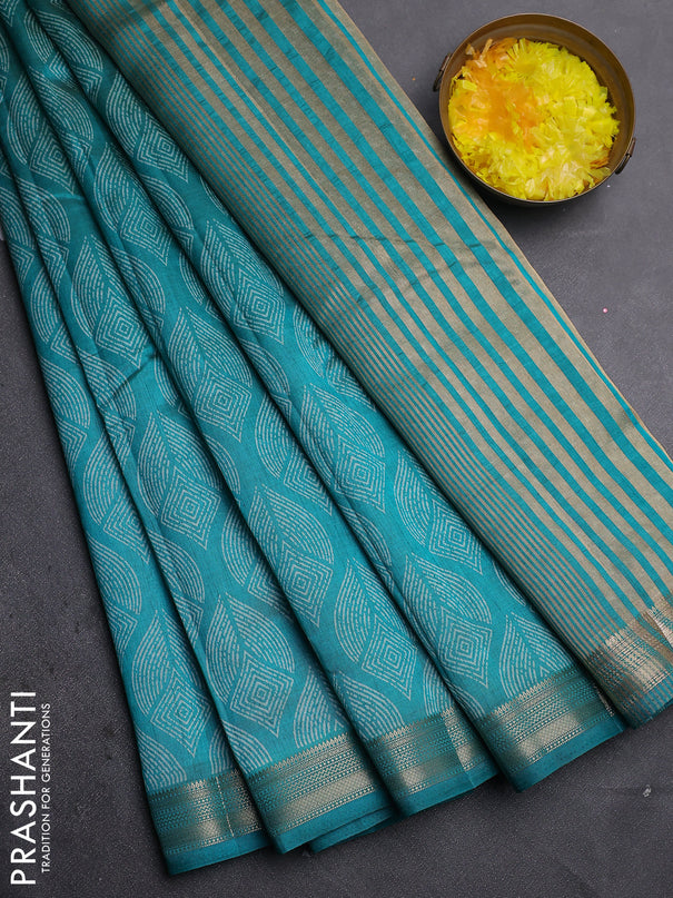 Semi raw silk saree teal green with allover geometric prints and zari woven border