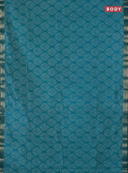 Semi raw silk saree teal green with allover geometric prints and zari woven border