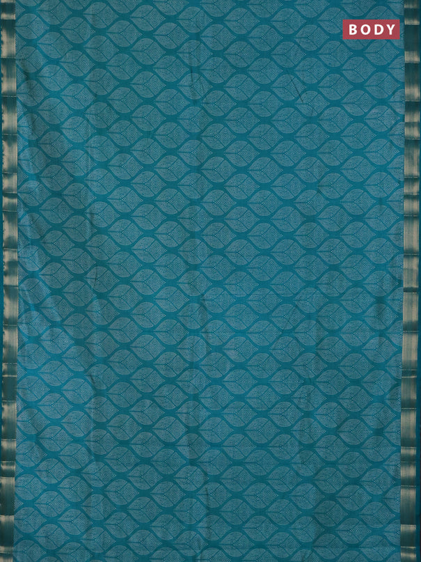 Semi raw silk saree teal green with allover geometric prints and zari woven border