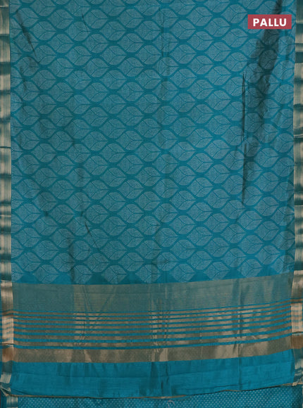 Semi raw silk saree teal green with allover geometric prints and zari woven border