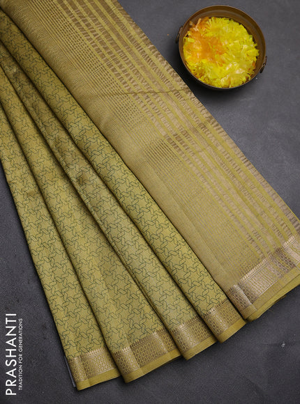 Semi raw silk saree mustard shade with allover geometric prints and zari woven border