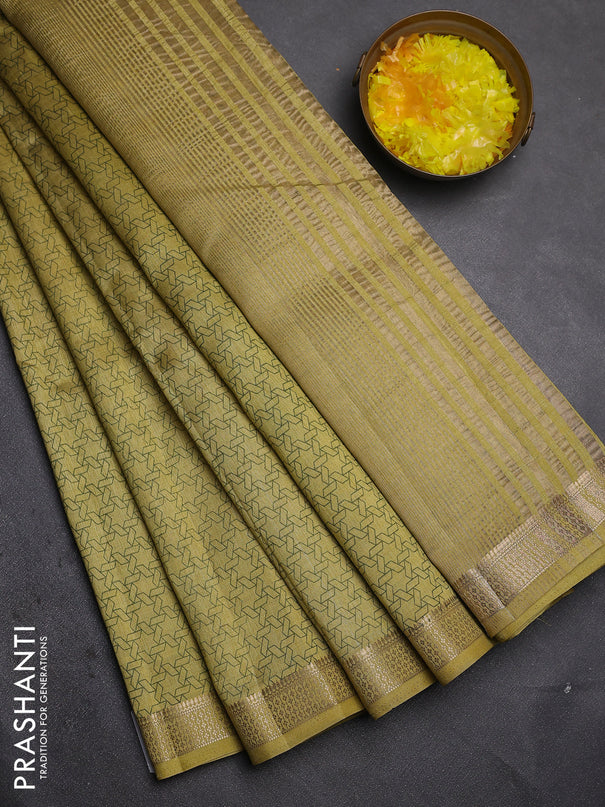 Semi raw silk saree mustard shade with allover geometric prints and zari woven border
