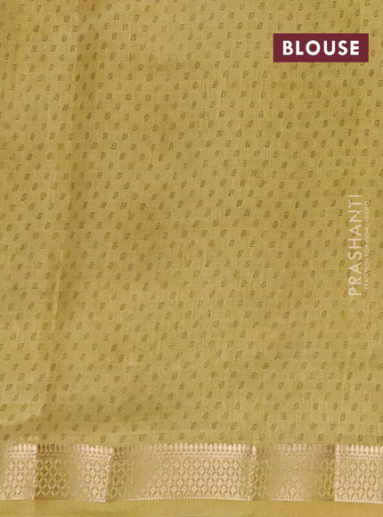 Semi raw silk saree mustard shade with allover geometric prints and zari woven border