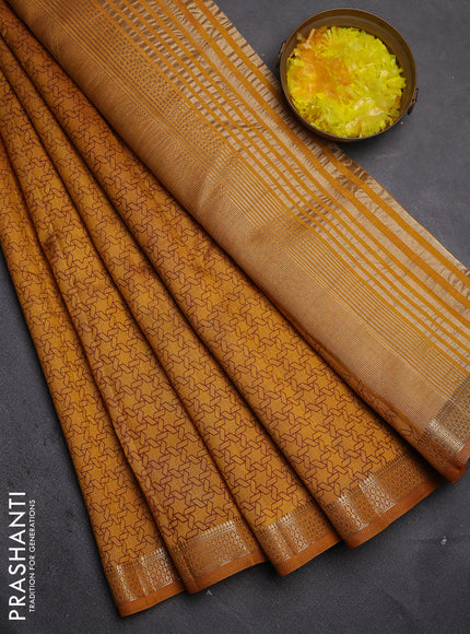 Semi raw silk saree dark mustard with allover geometric prints and zari woven border