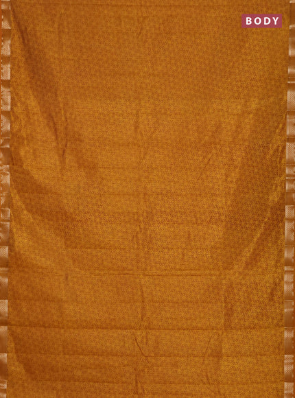 Semi raw silk saree dark mustard with allover geometric prints and zari woven border