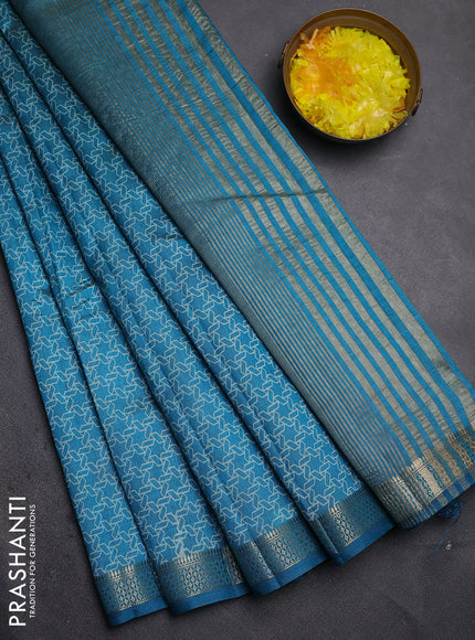Semi raw silk saree teal blue with allover geometric prints and zari woven border
